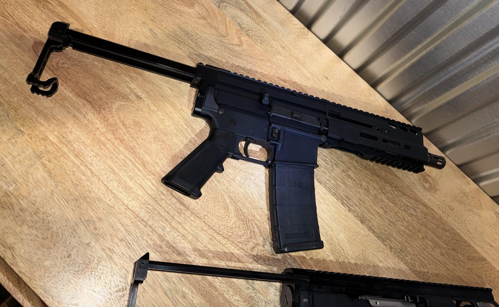 Blecher LLC Mongoose with Brace extended on a wooden desk